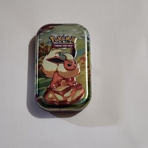 POKEMON PRISMATIC EVOLUTIONS FLAREON MINI TIN With Cards